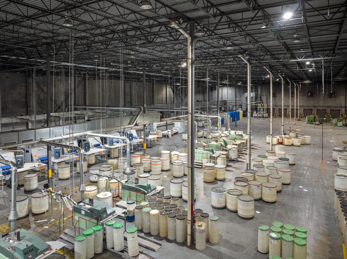Production hall of a textile plant cataloged by Redfield Group