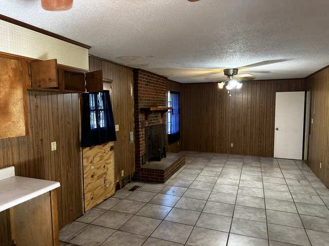 Living area with brick fireplace