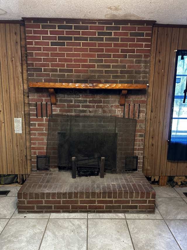 Wood mantel over the firebox