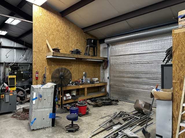 Roll-up door with bench wall